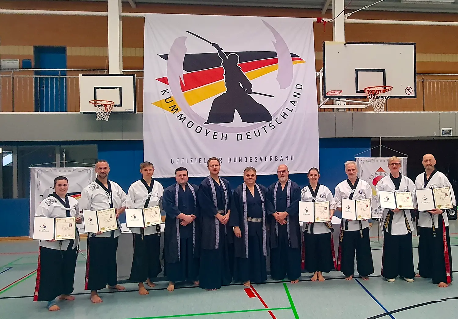 Featured image for “Erfolgreiche Kampfkünstler*innen bei der zweiten Bundes Dan Prüfung Kummooyeh in Wolfenbüttel”